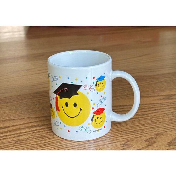 Graduation Smiley Face Mug White Ceramic With Colorful Caps & Diplomas - Picture 2 of 6